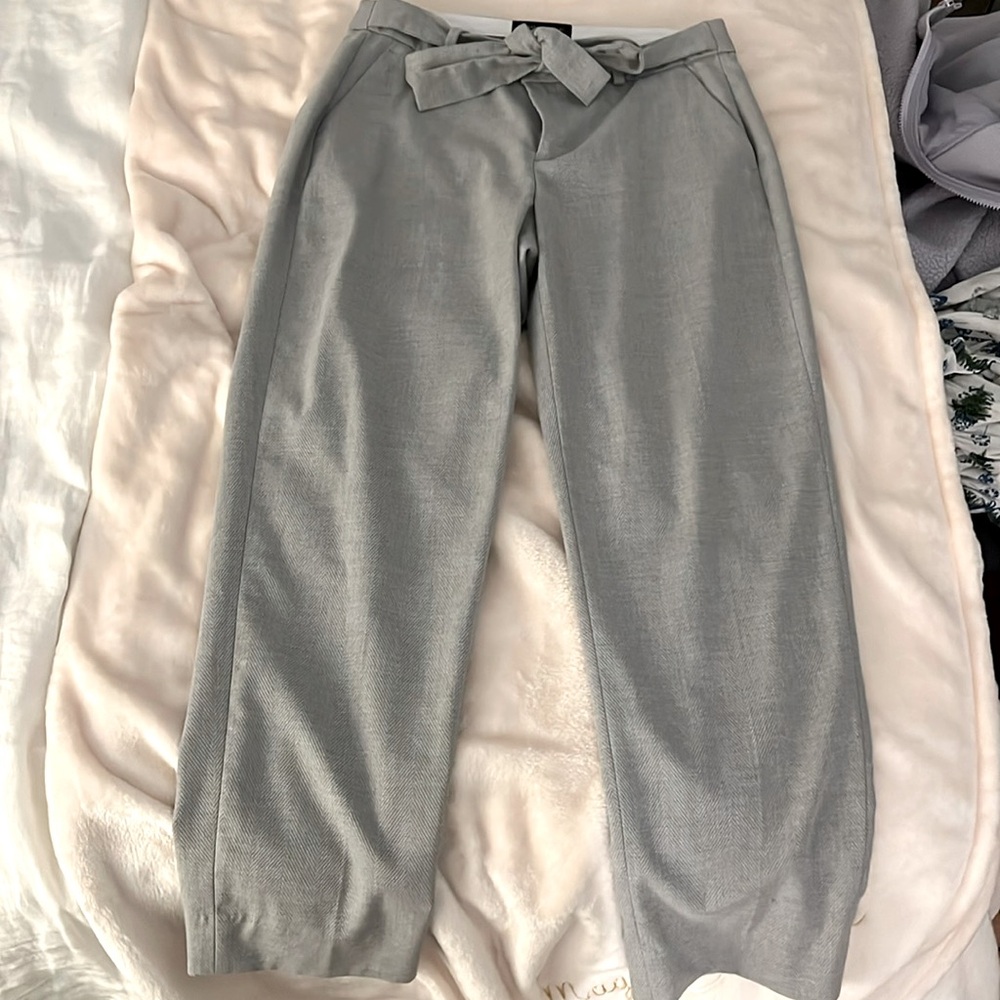 Banana Republic grey and white herringbone tie-waist work pants.